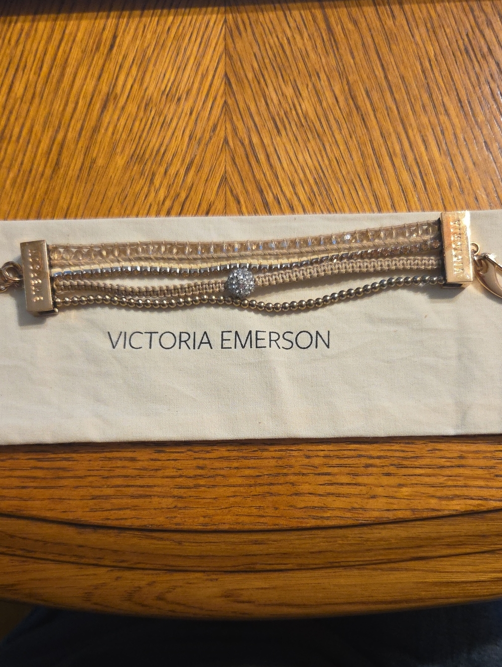 Victoria Emerson Gold Layered Chain Bracelet with Crystal Charm